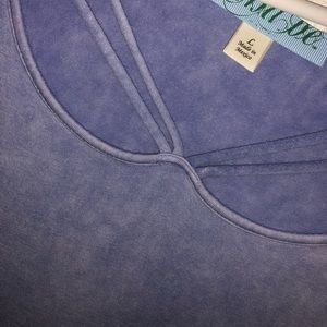a blue tee with a cross neckline